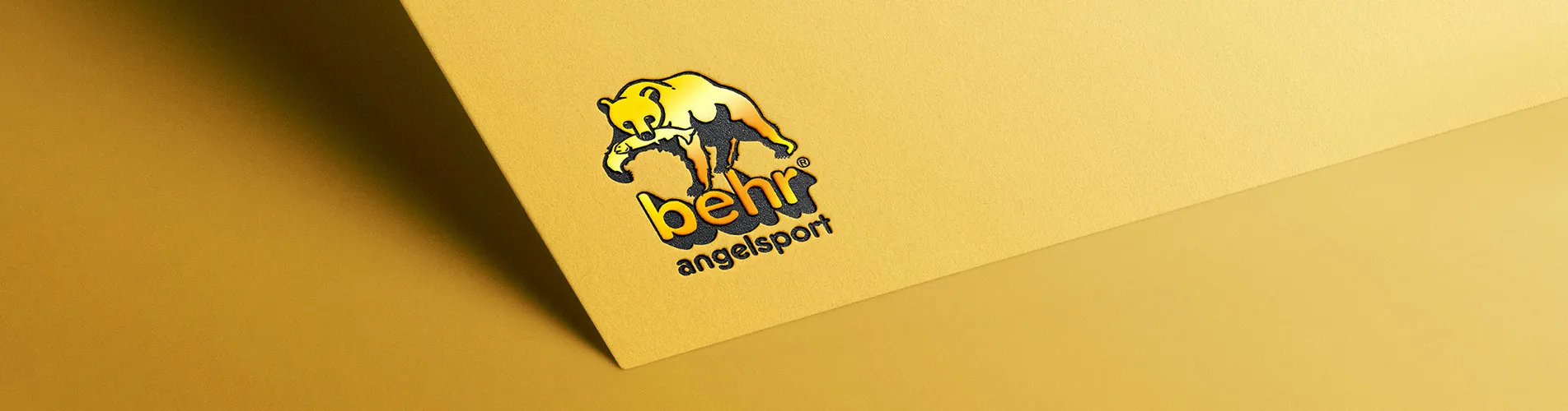 Gelbes Logo Emblem von Behr Angelsport.